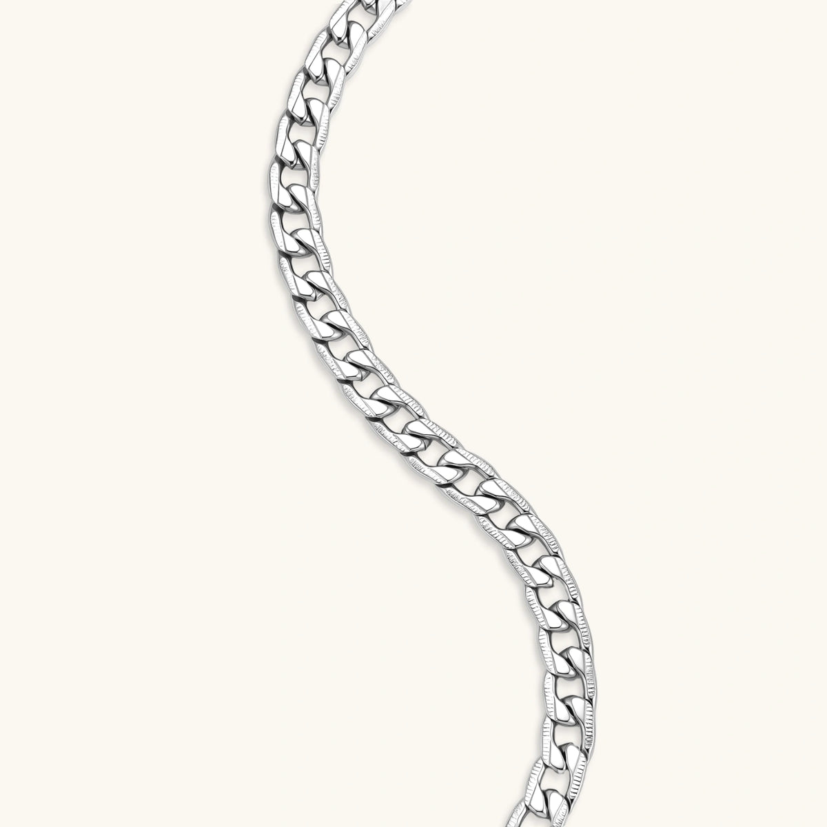 Silver 316L stainless steel carved curb chain necklace with lobster clasp and extender, 7.2mm wide, on cream background.