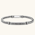 Silver stainless steel men's bracelet with braided foxtail chain, Greek key engraved bar, and decorative cube connectors.