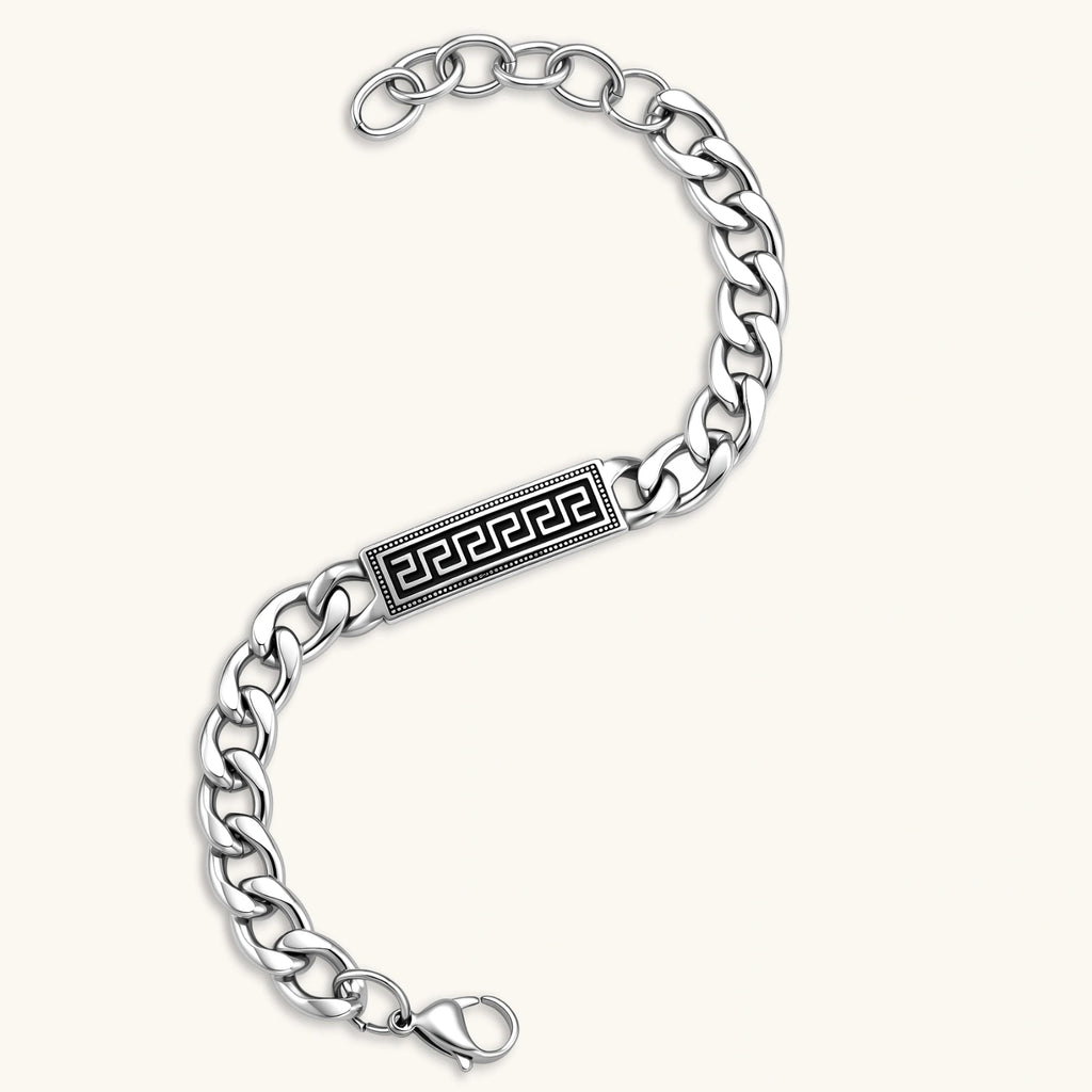 Silver 316L stainless steel curb chain bracelet with black Greek key meander rectangular ID plate, adjustable lobster clasp.