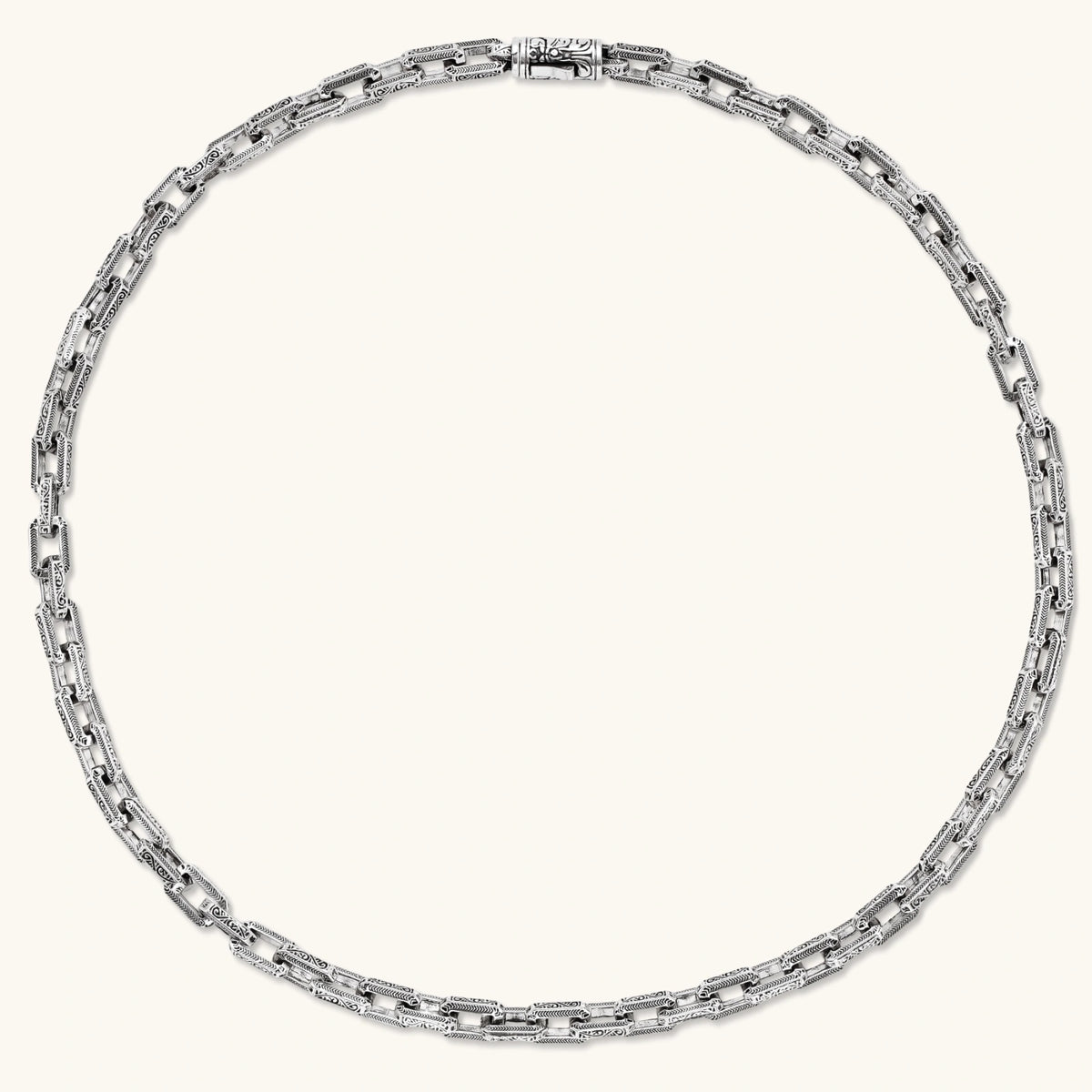 Silver 316L stainless steel rectangular link chain necklace with intricate scroll engravings, 560mm length, 7.1mm width.