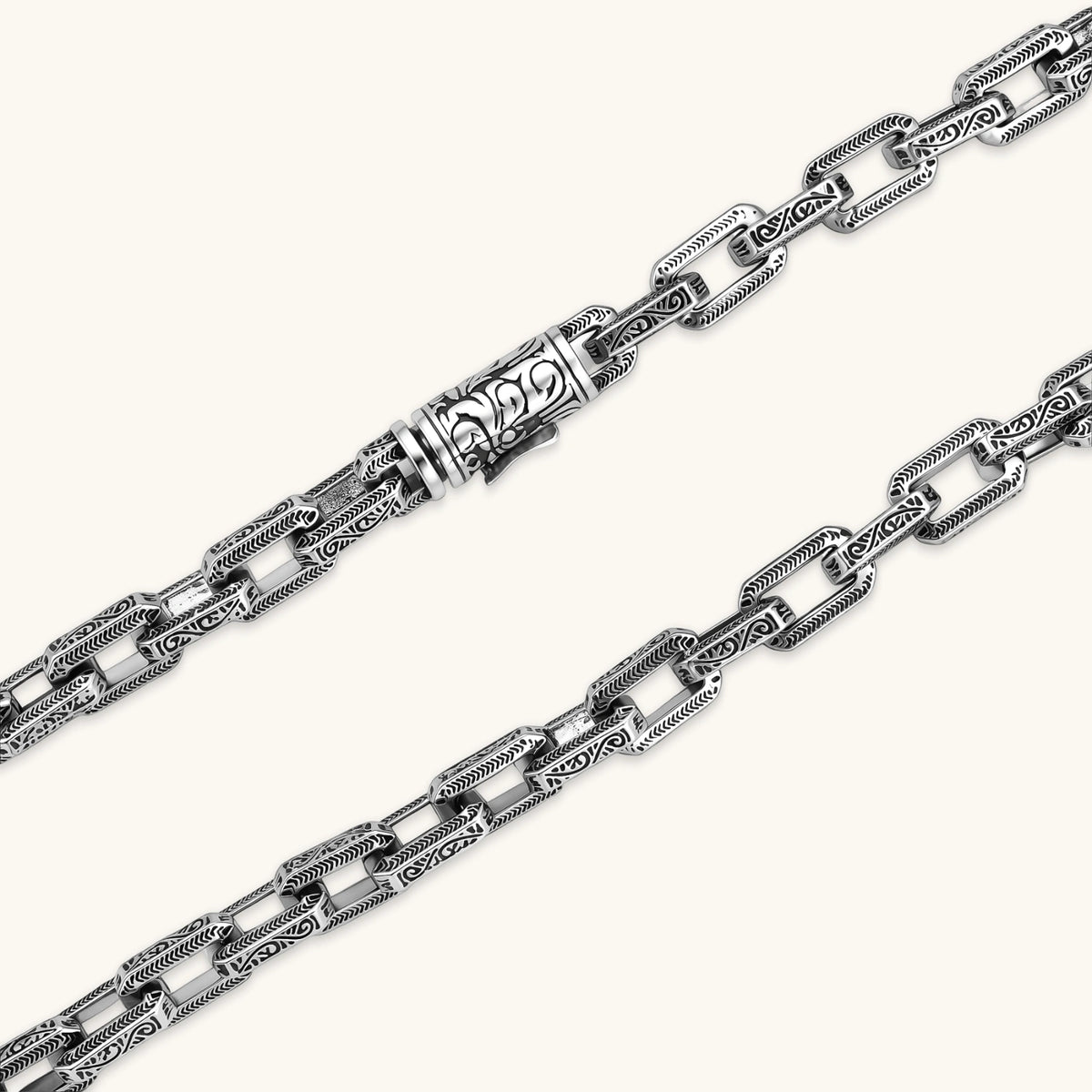 Silver 316L stainless steel rectangular link chain necklace with intricate scroll engravings, 560mm length, 7.1mm width.
