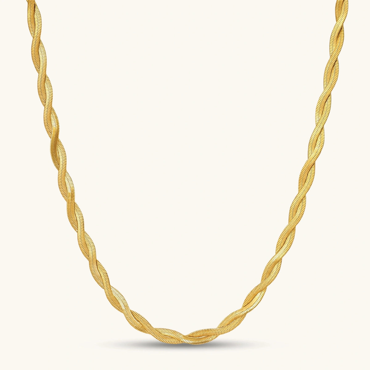 18K gold-plated twisted double herringbone snake chain necklace with lobster clasp and extender on white background.