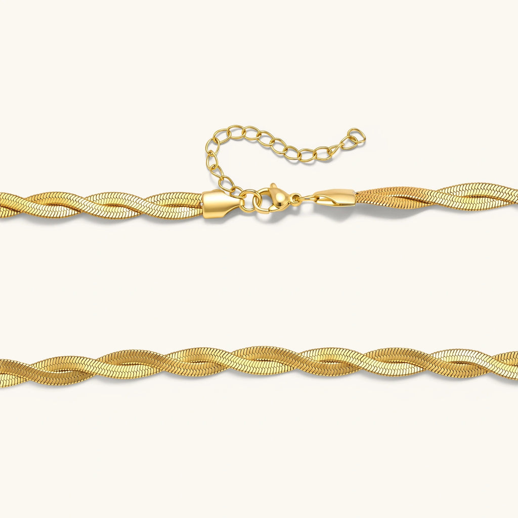 18K gold-plated twisted double herringbone snake chain necklace with lobster clasp and extender on white background.