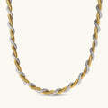 Two-tone twisted necklace with interlocked gold and silver ribbed snake chains, 6mm wide, on a white background.