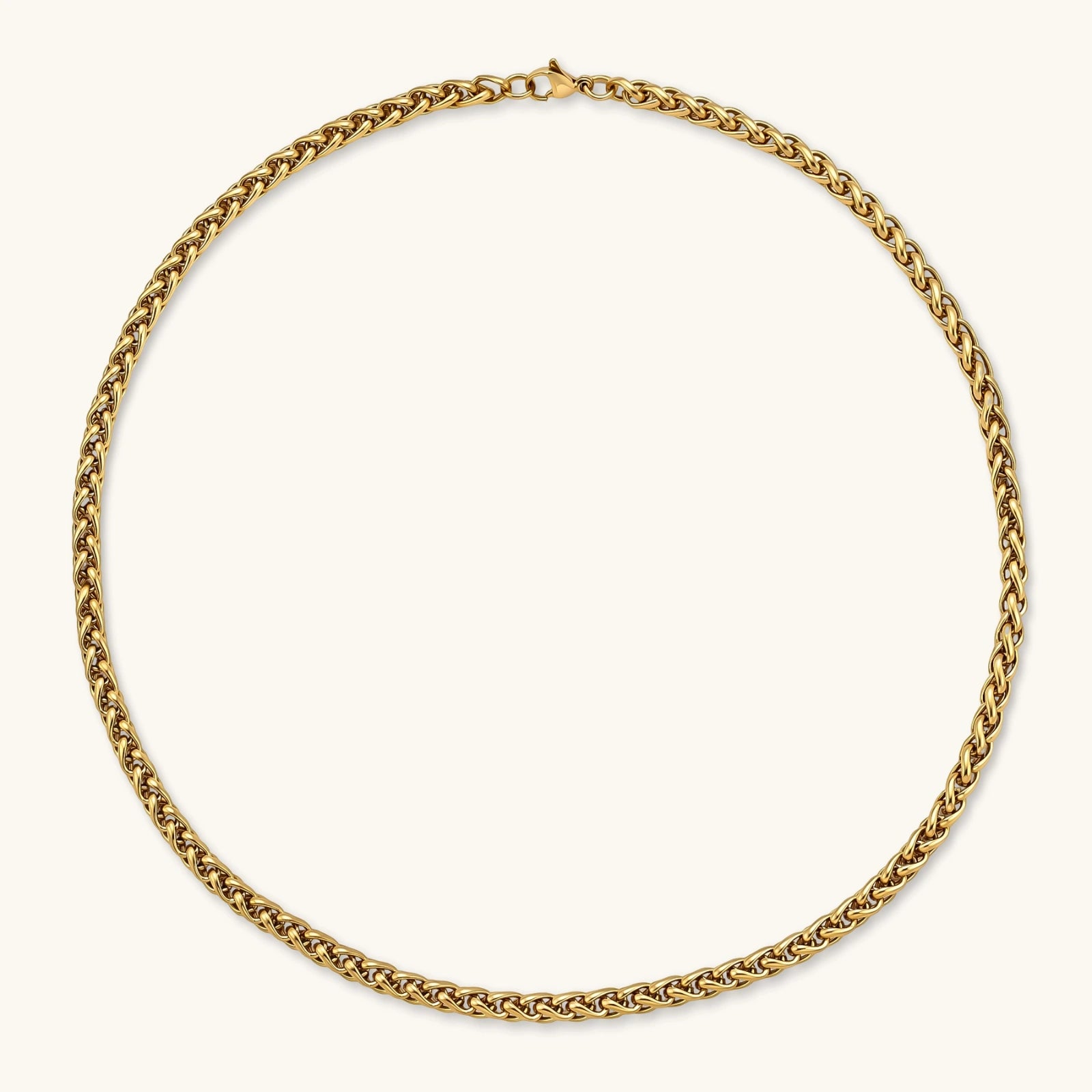 18K gold-plated stainless steel wheat chain necklace, 4.2mm wide, with lobster clasp, on off-white background.