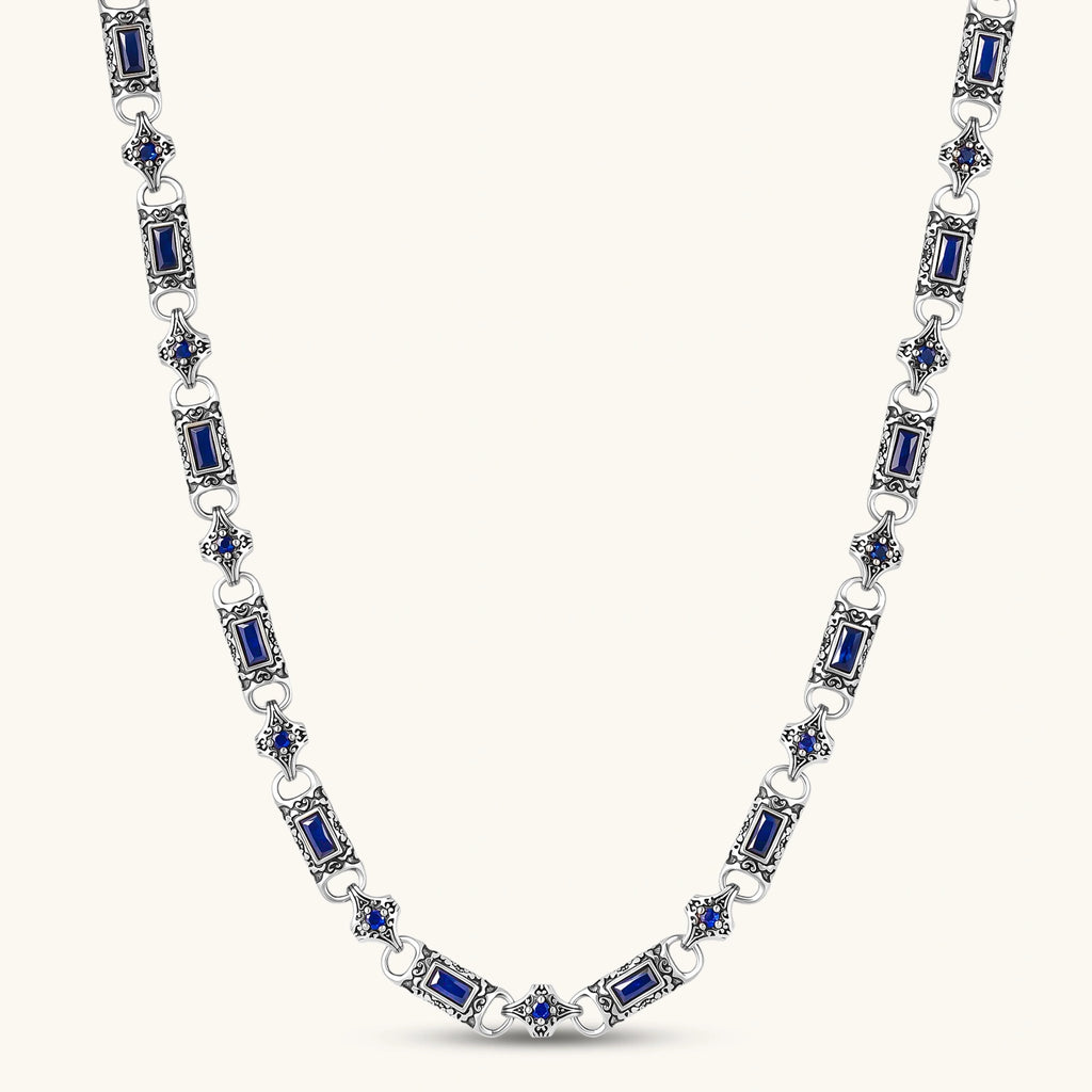 Oxidized silver 316L stainless steel chain necklace with rectangular navy CZ links and ornate gothic connector pieces, 640mm.