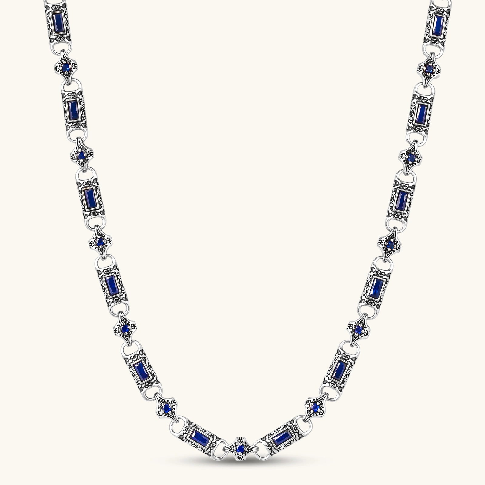 Oxidized silver 316L stainless steel chain necklace with rectangular navy CZ links and ornate gothic connector pieces, 640mm.