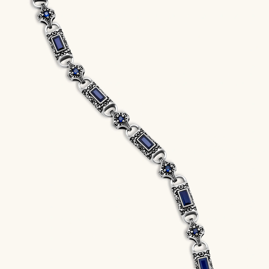 Oxidized silver 316L stainless steel chain necklace with rectangular navy CZ links and ornate gothic connector pieces, 640mm.
