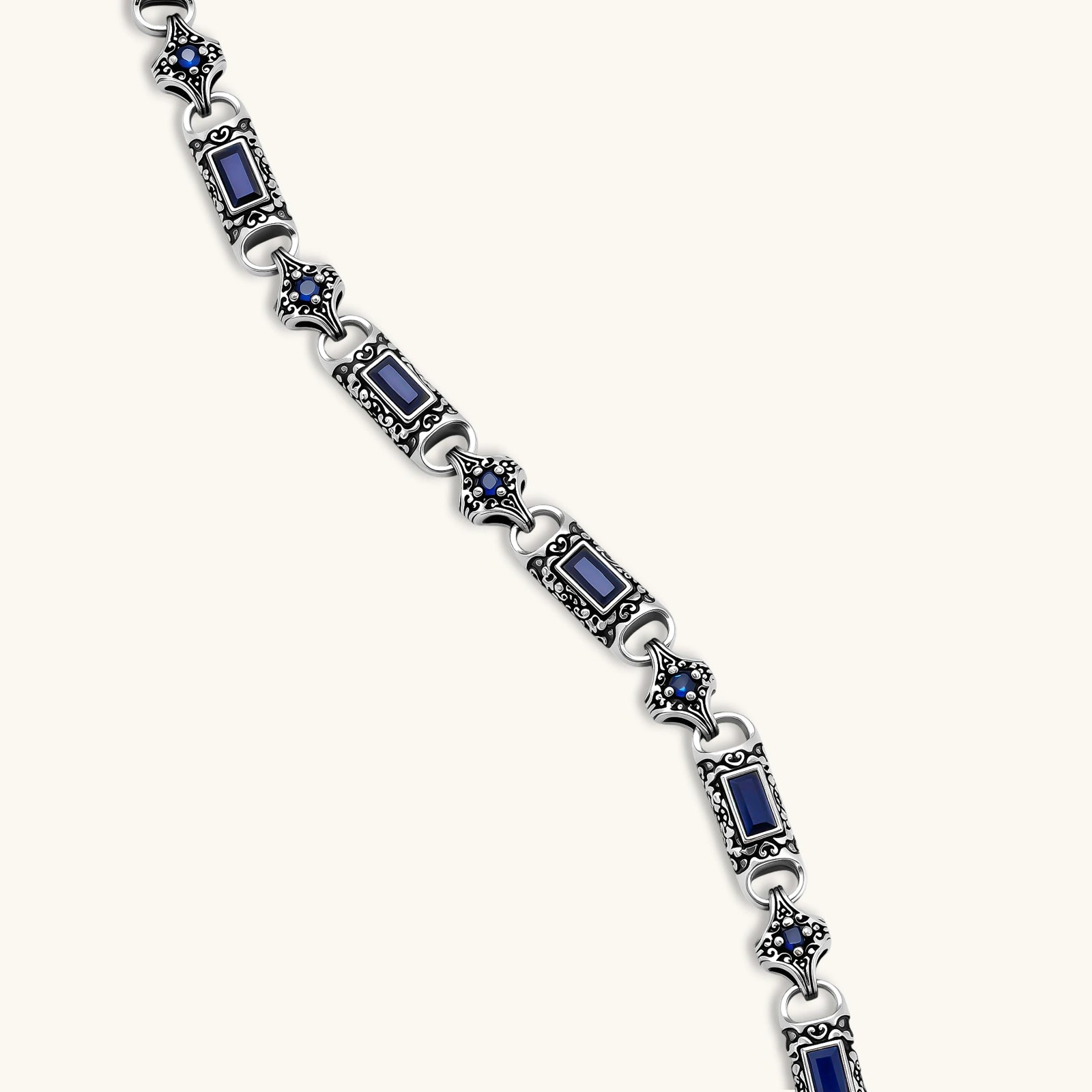 Oxidized silver 316L stainless steel chain necklace with rectangular navy CZ links and ornate gothic connector pieces, 640mm.