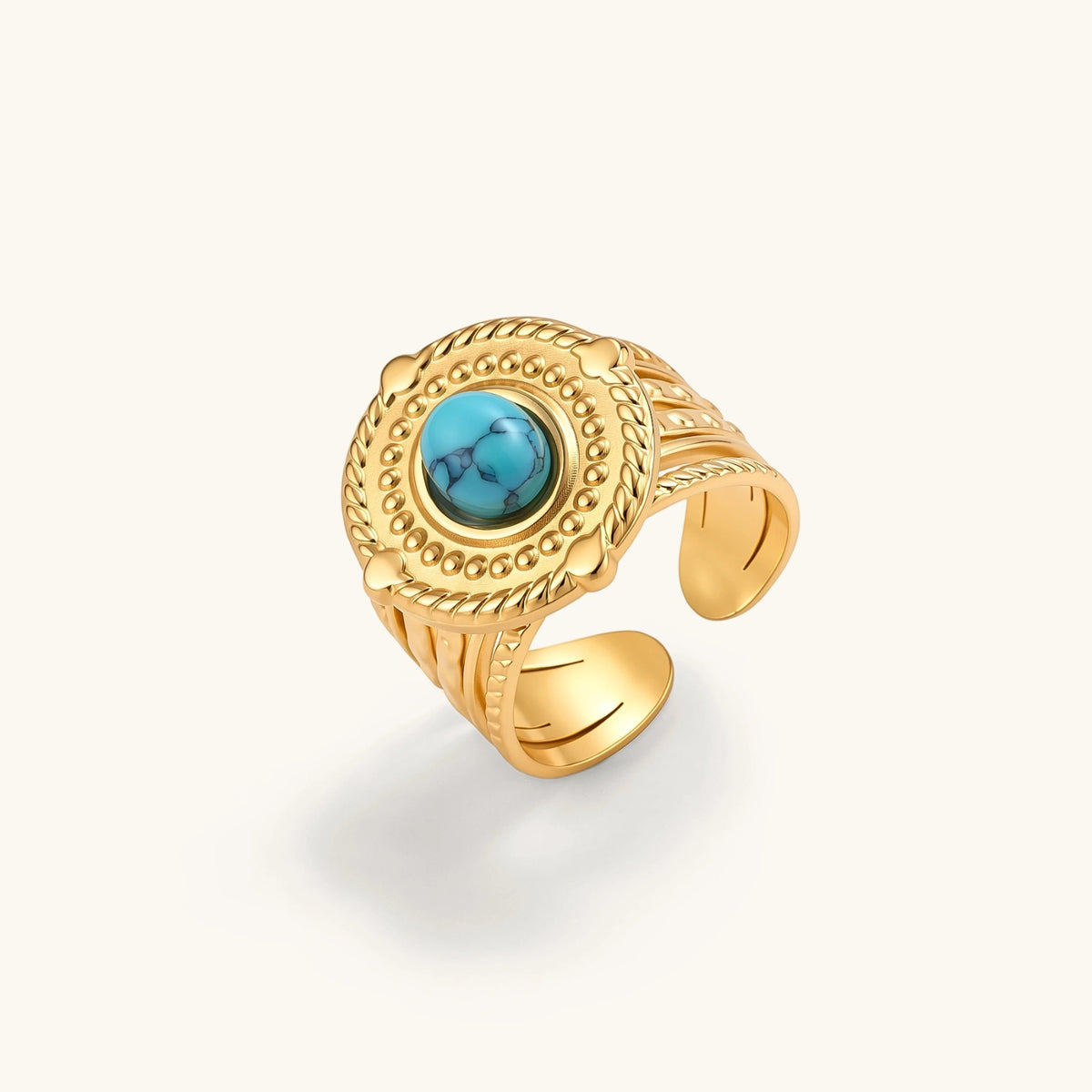 18K gold PVD stainless steel open signet ring with round turquoise cabochon, rope-twist border, beaded detail, multi-band shank.